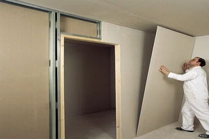 Drywall com gesso acartonado, guias e montantes.